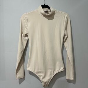 Express Cream Long Sleeve Bodysuit